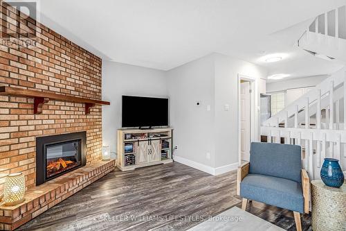 26 - 1399 Commissioners Road W, London South (South B), ON - Indoor Photo Showing Living Room With Fireplace