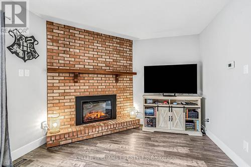 26 - 1399 Commissioners Road W, London South (South B), ON - Indoor Photo Showing Living Room With Fireplace
