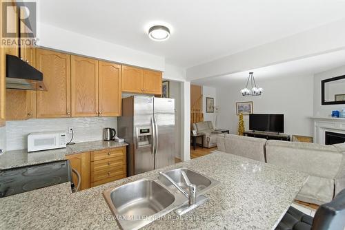 12 Gaudi Road, Toronto, ON - Indoor Photo Showing Kitchen With Stainless Steel Kitchen With Double Sink
