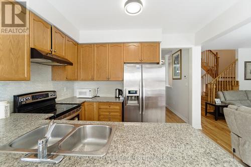 12 Gaudi Road, Toronto, ON - Indoor Photo Showing Kitchen With Stainless Steel Kitchen With Double Sink