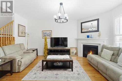 12 Gaudi Road, Toronto, ON - Indoor Photo Showing Living Room With Fireplace