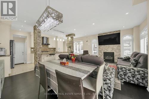 13 Masken Circle, Brampton, ON - Indoor Photo Showing Dining Room With Fireplace