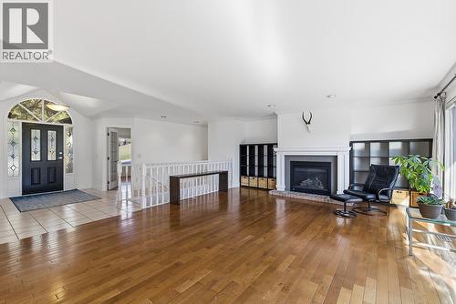 Living Room - 745 Cassiar Crescent, Kelowna, BC - Indoor Photo Showing Living Room With Fireplace