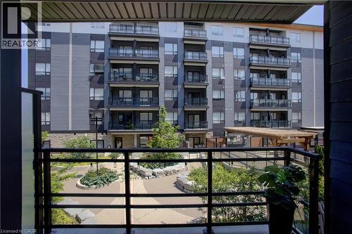 243 Northfield Drive E Unit# 208, Waterloo, ON - Outdoor With Balcony With Facade