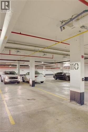 243 Northfield Drive E Unit# 208, Waterloo, ON - Indoor Photo Showing Garage