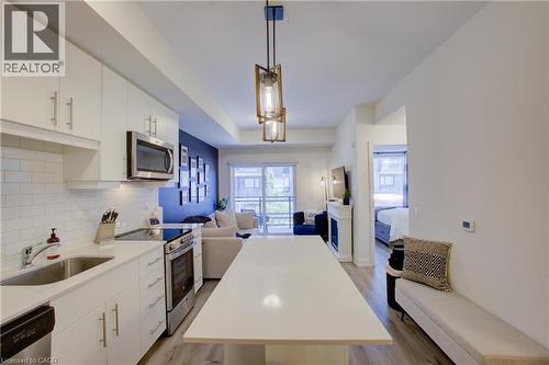 243 Northfield Drive E Unit# 208, Waterloo, ON - Indoor Photo Showing Kitchen With Stainless Steel Kitchen With Upgraded Kitchen