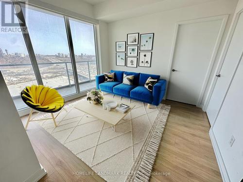 Virtually Staged - 2011 - 117 Mcmahon Drive, Toronto, ON - Indoor Photo Showing Living Room