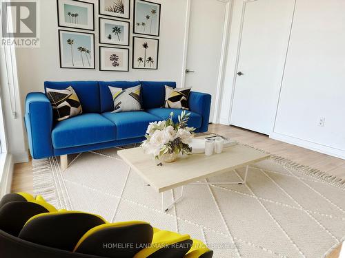 Virtually Staged - 2011 - 117 Mcmahon Drive, Toronto, ON - Indoor Photo Showing Living Room