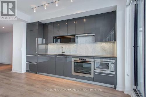 2011 - 117 Mcmahon Drive, Toronto, ON - Indoor Photo Showing Kitchen With Upgraded Kitchen