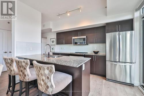 1709 - 55 Speers Road, Oakville, ON - Indoor Photo Showing Kitchen With Stainless Steel Kitchen With Double Sink