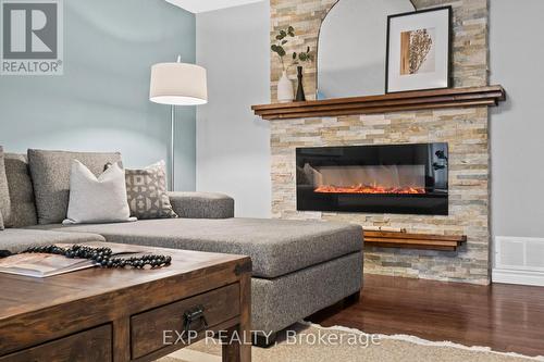 3005 Olympus Mews, Mississauga, ON - Indoor Photo Showing Living Room With Fireplace