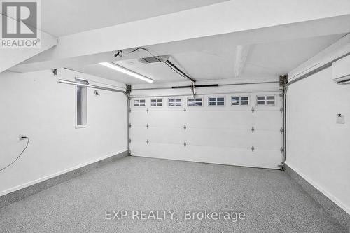 Climate Controlled Garage - 3005 Olympus Mews, Mississauga, ON - Indoor Photo Showing Garage