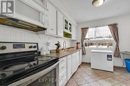 4 - 1180 Mississauga Valley Boulevard, Mississauga, ON - Indoor Photo Showing Kitchen With Double Sink