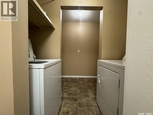 B 64 Nollet Avenue, Regina, SK - Indoor Photo Showing Laundry Room