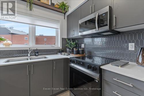 18 - 42 Lowes Road, Guelph, ON - Indoor Photo Showing Kitchen With Double Sink