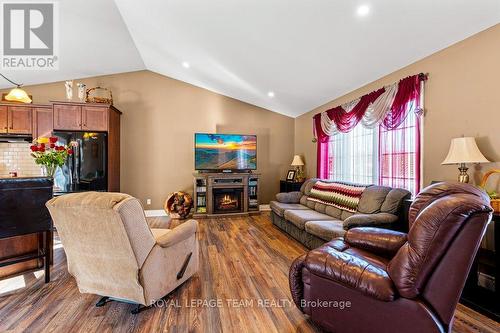 8094 County Road 44 Road, Edwardsburgh/Cardinal, ON - Indoor Photo Showing Living Room With Fireplace