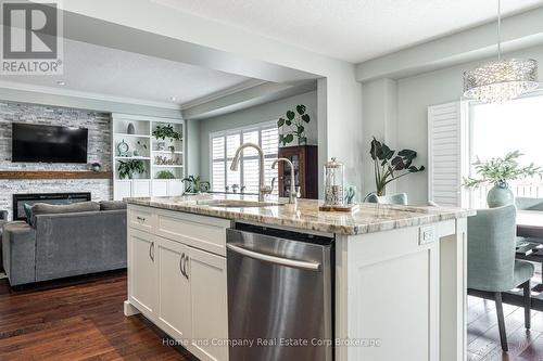81 Thomas Street, Stratford, ON - Indoor Photo Showing Kitchen With Fireplace With Upgraded Kitchen