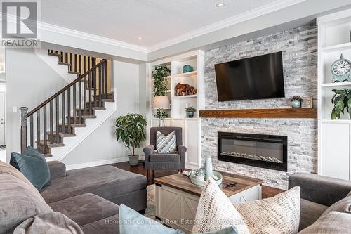 81 Thomas Street, Stratford, ON - Indoor Photo Showing Living Room With Fireplace