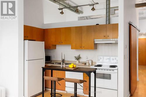 804 - 700 King Street, Toronto, ON - Indoor Photo Showing Kitchen With Double Sink
