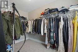 Primary Bedroom Walk in Closet - 