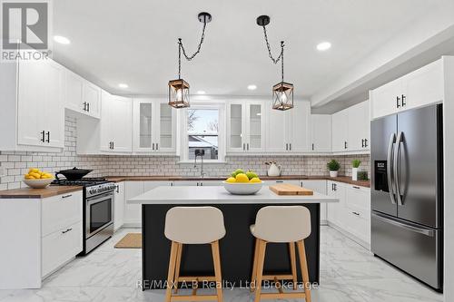 This image has been virtually staged - 307 Nelson Street, Stratford, ON - Indoor Photo Showing Kitchen With Upgraded Kitchen