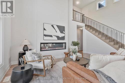 87 Goldie Court, Blue Mountains, ON - Indoor Photo Showing Living Room With Fireplace