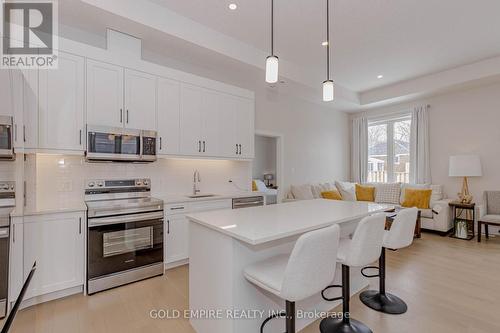 18 - 7966 Fallon Drive, Lucan Biddulph (Granton), ON - Indoor Photo Showing Kitchen With Upgraded Kitchen
