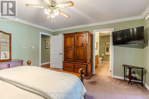 383 Peek-A-Boo Trail, Tiny, ON - Indoor Photo Showing Bedroom