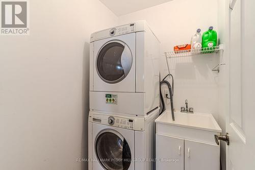 383 Peek-A-Boo Trail, Tiny, ON - Indoor Photo Showing Laundry Room