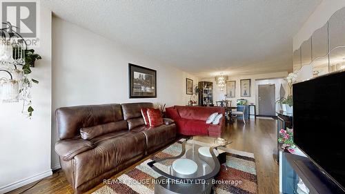 901 - 131 Torresdale Avenue, Toronto, ON - Indoor Photo Showing Living Room