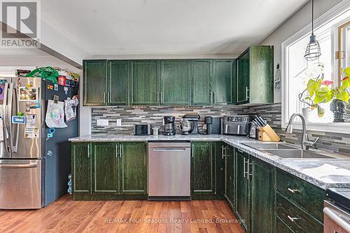 1046 County 124 Road N, Clearview (Singhampton), ON - Indoor Photo Showing Kitchen With Double Sink