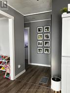 hallway leading to bedrooms & bathroom - 