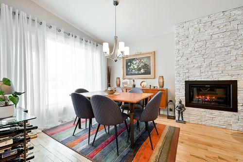 Salle à manger - 111 Rue Jubilee, Longueuil (Greenfield Park), QC - Indoor Photo Showing Other Room With Fireplace