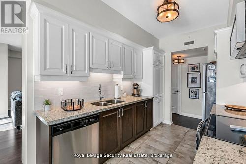 217 - 54 Koda Street, Barrie, ON - Indoor Photo Showing Kitchen With Double Sink With Upgraded Kitchen