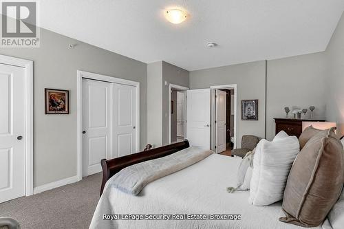 217 - 54 Koda Street, Barrie, ON - Indoor Photo Showing Bedroom