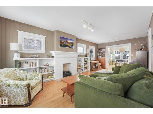 11036 125 St Nw, Edmonton, AB - Indoor Photo Showing Living Room With Fireplace