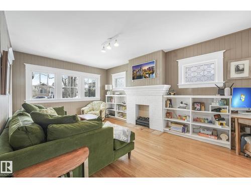 11036 125 St Nw, Edmonton, AB - Indoor Photo Showing Living Room With Fireplace