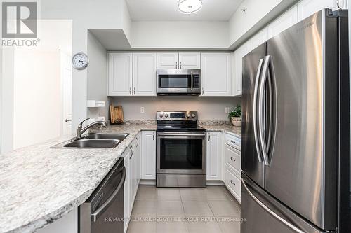 404 - 295 Cundles Road E, Barrie, ON - Indoor Photo Showing Kitchen With Stainless Steel Kitchen With Double Sink