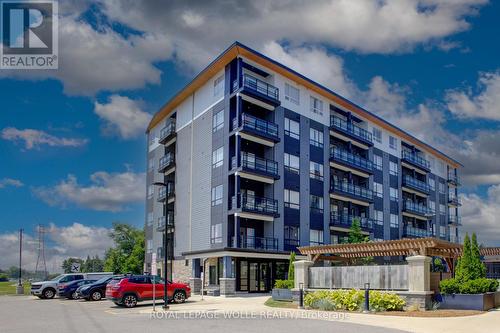 #208 - 243 Northfield Drive E, Waterloo, ON - Outdoor With Balcony With Facade