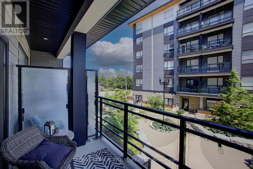 private patio - #208 - 243 Northfield Drive E, Waterloo, ON - Outdoor With Balcony