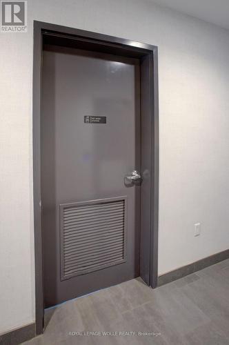 Door to storage locker - #208 - 243 Northfield Drive E, Waterloo, ON - Indoor Photo Showing Other Room