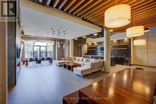 common area - #208 - 243 Northfield Drive E, Waterloo, ON - Indoor With Fireplace