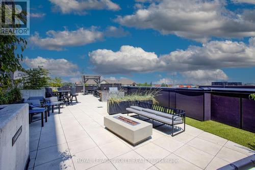 common area patio - #208 - 243 Northfield Drive E, Waterloo, ON - Outdoor With View