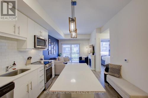 #208 - 243 Northfield Drive E, Waterloo, ON - Indoor Photo Showing Kitchen With Stainless Steel Kitchen With Upgraded Kitchen