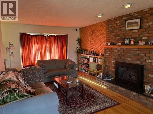 784 Funn Street, Quesnel, BC - Indoor Photo Showing Living Room With Fireplace