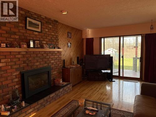 784 Funn Street, Quesnel, BC - Indoor Photo Showing Living Room With Fireplace
