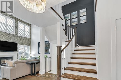 stairs - 2099 Helmsley Avenue, Oakville (Wm Westmount), ON - Indoor Photo Showing Other Room With Fireplace