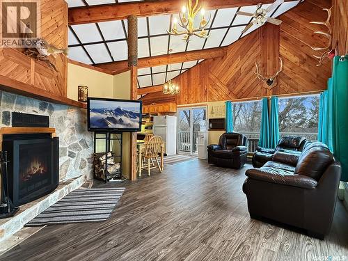 105 Otter Crescent, Beaver Flat, SK - Indoor Photo Showing Living Room With Fireplace