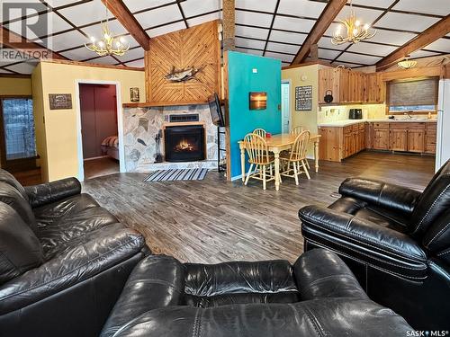 105 Otter Crescent, Beaver Flat, SK - Indoor Photo Showing Living Room With Fireplace