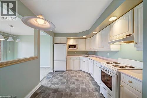 1061 Vansickle Road N Unit# 303B, St. Catharines, ON - Indoor Photo Showing Kitchen With Double Sink